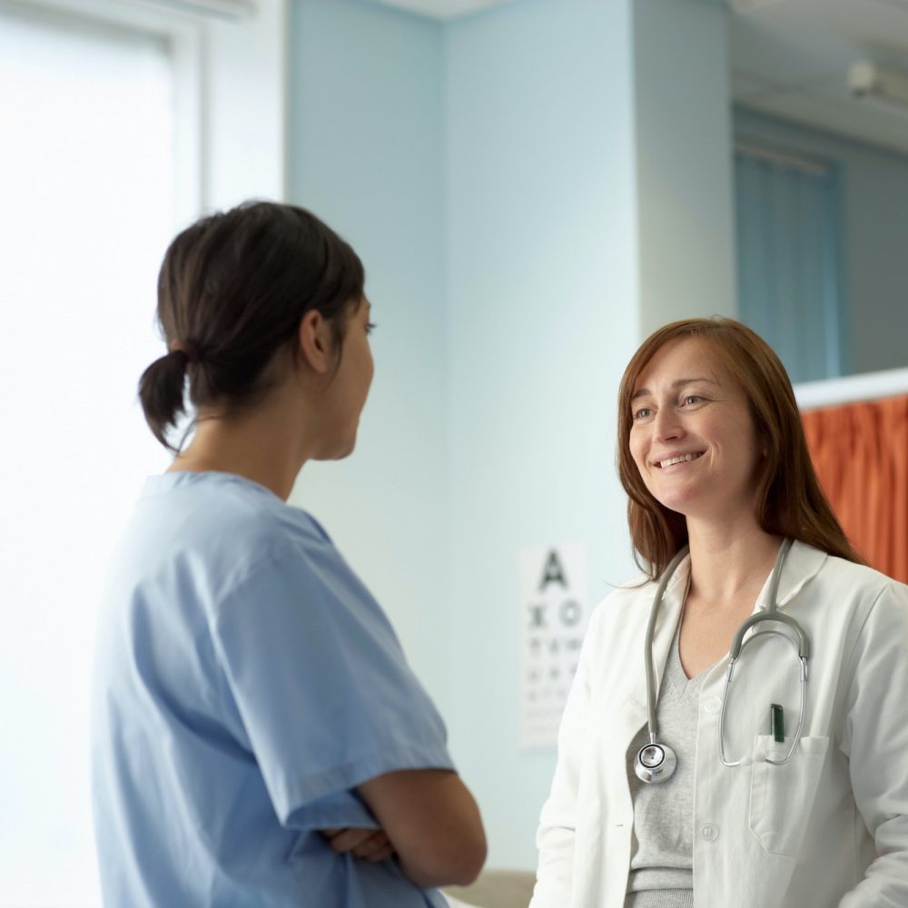 Nurse and doctor in discussion